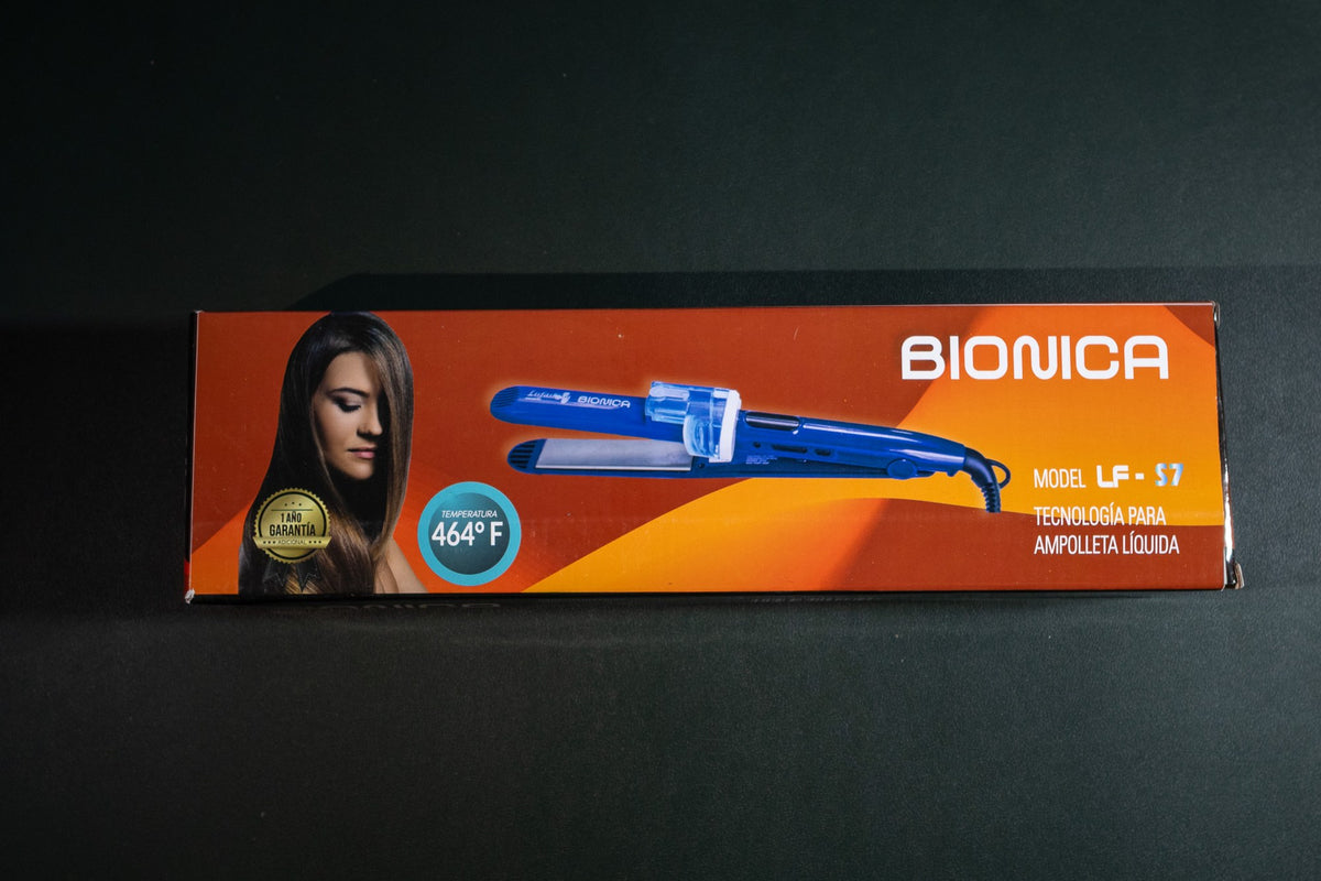 Plancha Lisfashion Biónica azul con depósito para ampolleta, vista de la caja sobre fondo oscuro